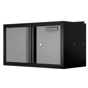 A metal wall-mounted storage cabinet with two doors, a lock, and a Craftsman brand label on the front.